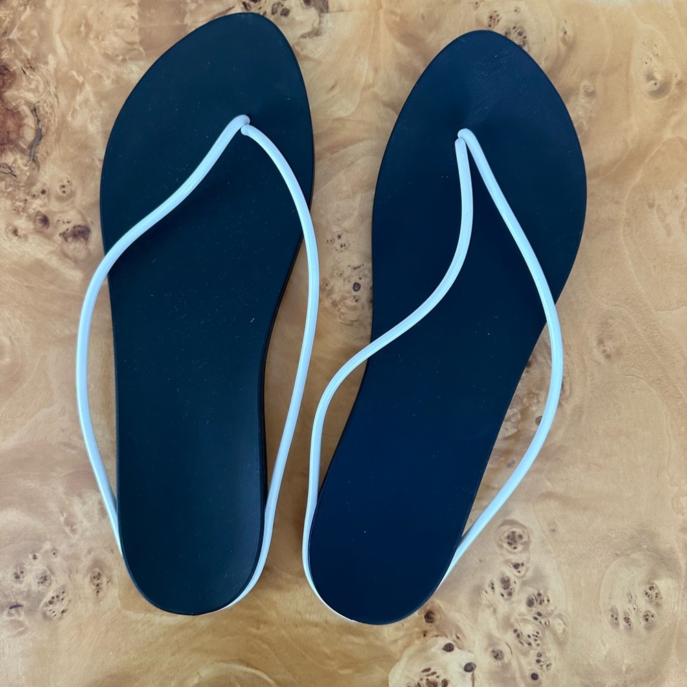New without tags minimalist flip flops by Starck x Ipanema size 10